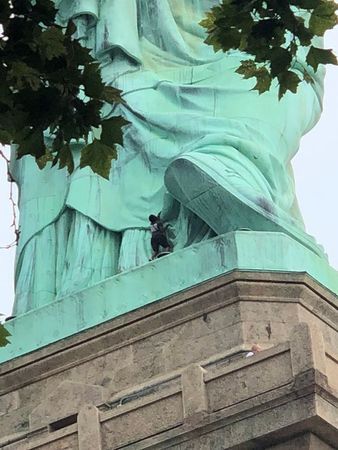 Statue of liberty protestor